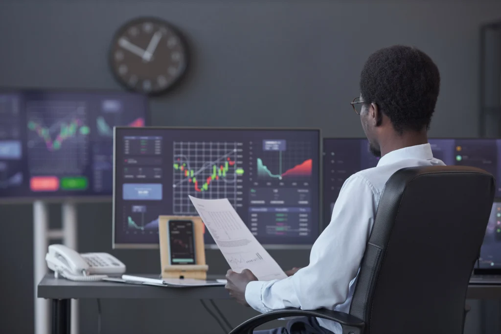 trader analyzing the financial market in office